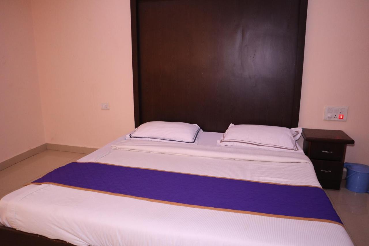 Smilestay Bns Lodge Bangalore Esterno foto