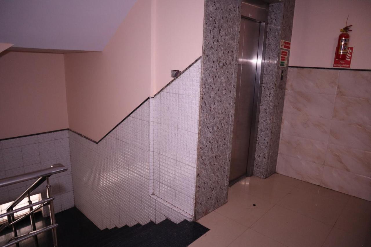 Smilestay Bns Lodge Bangalore Esterno foto