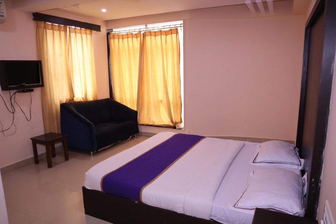 Smilestay Bns Lodge Bangalore Esterno foto