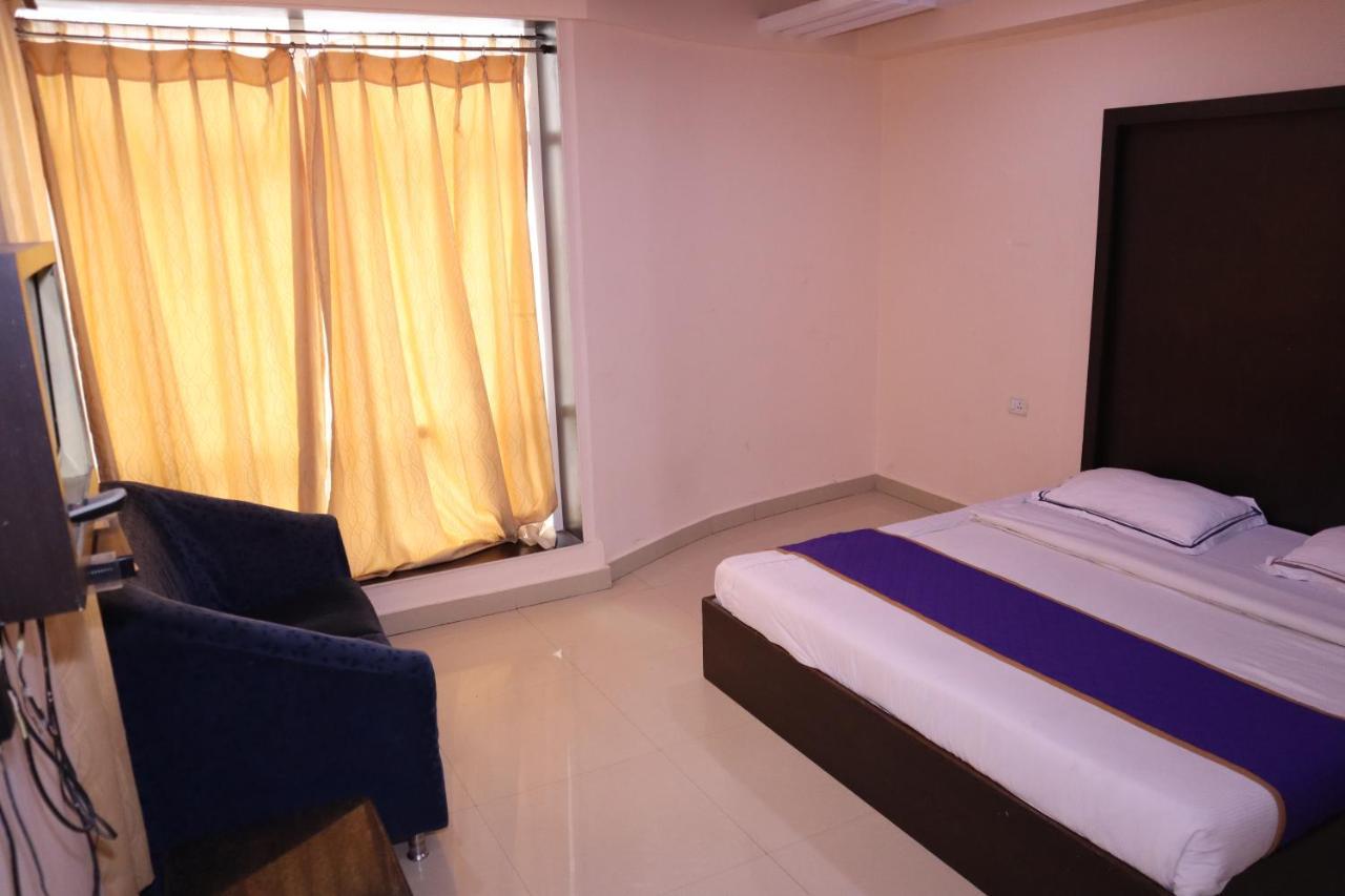 Smilestay Bns Lodge Bangalore Esterno foto