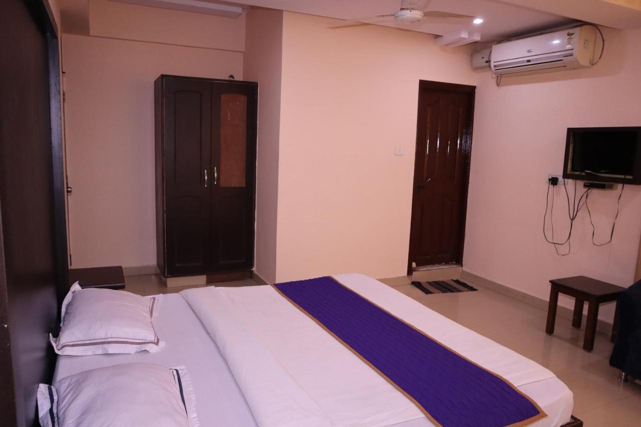 Smilestay Bns Lodge Bangalore Esterno foto