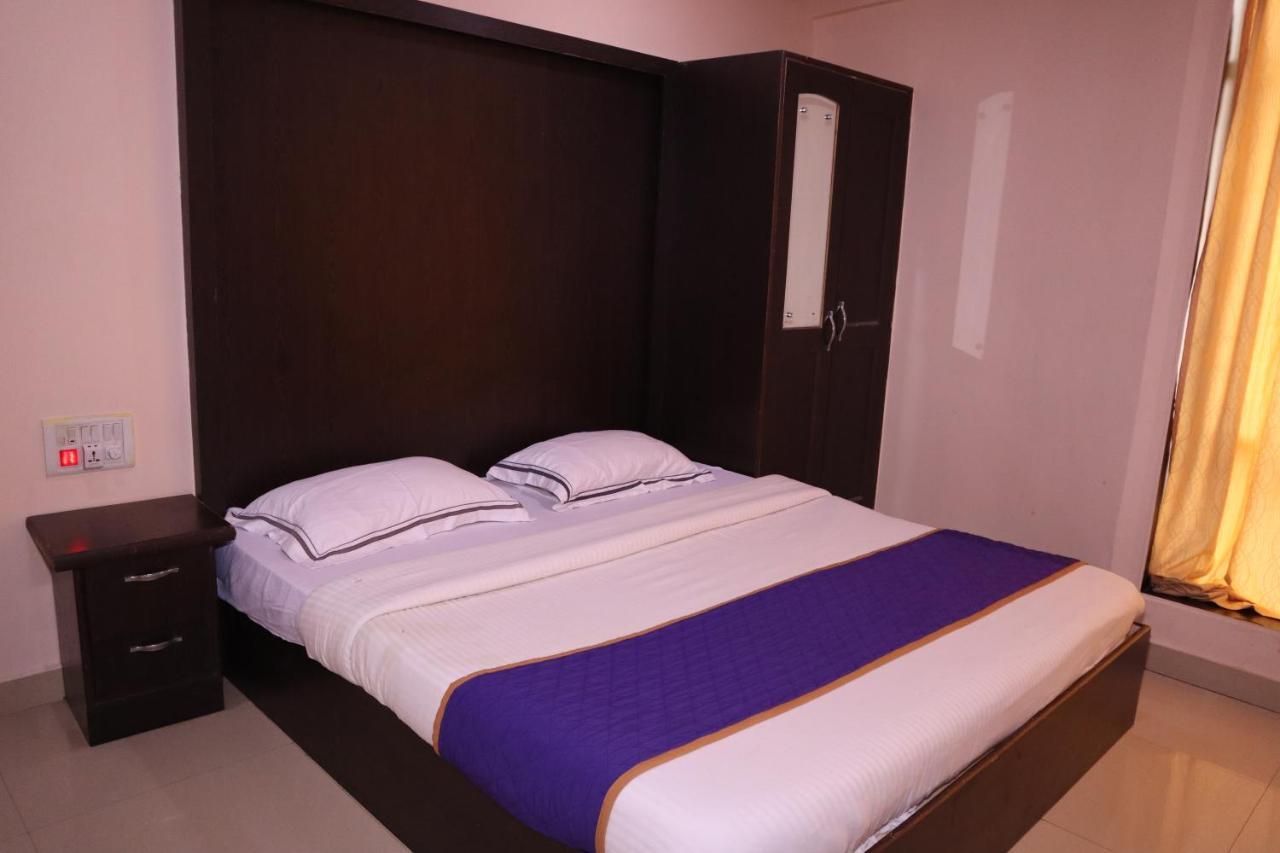 Smilestay Bns Lodge Bangalore Esterno foto