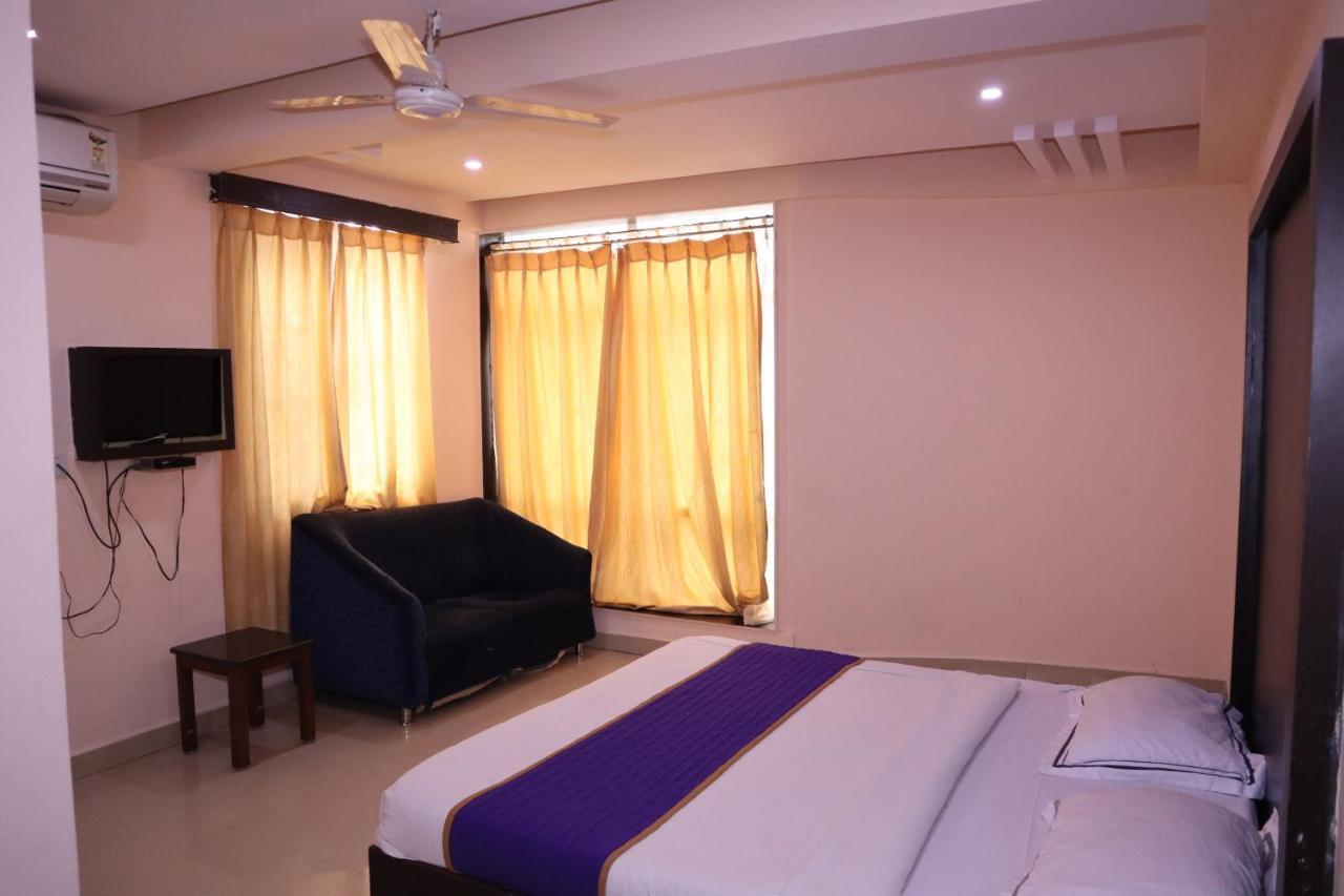 Smilestay Bns Lodge Bangalore Esterno foto
